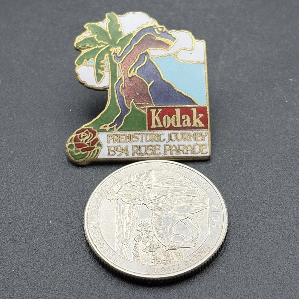1994 Rose Parade Prehistoric Journey Dinosaur Kodak Sponsor Lapel Hat Pin